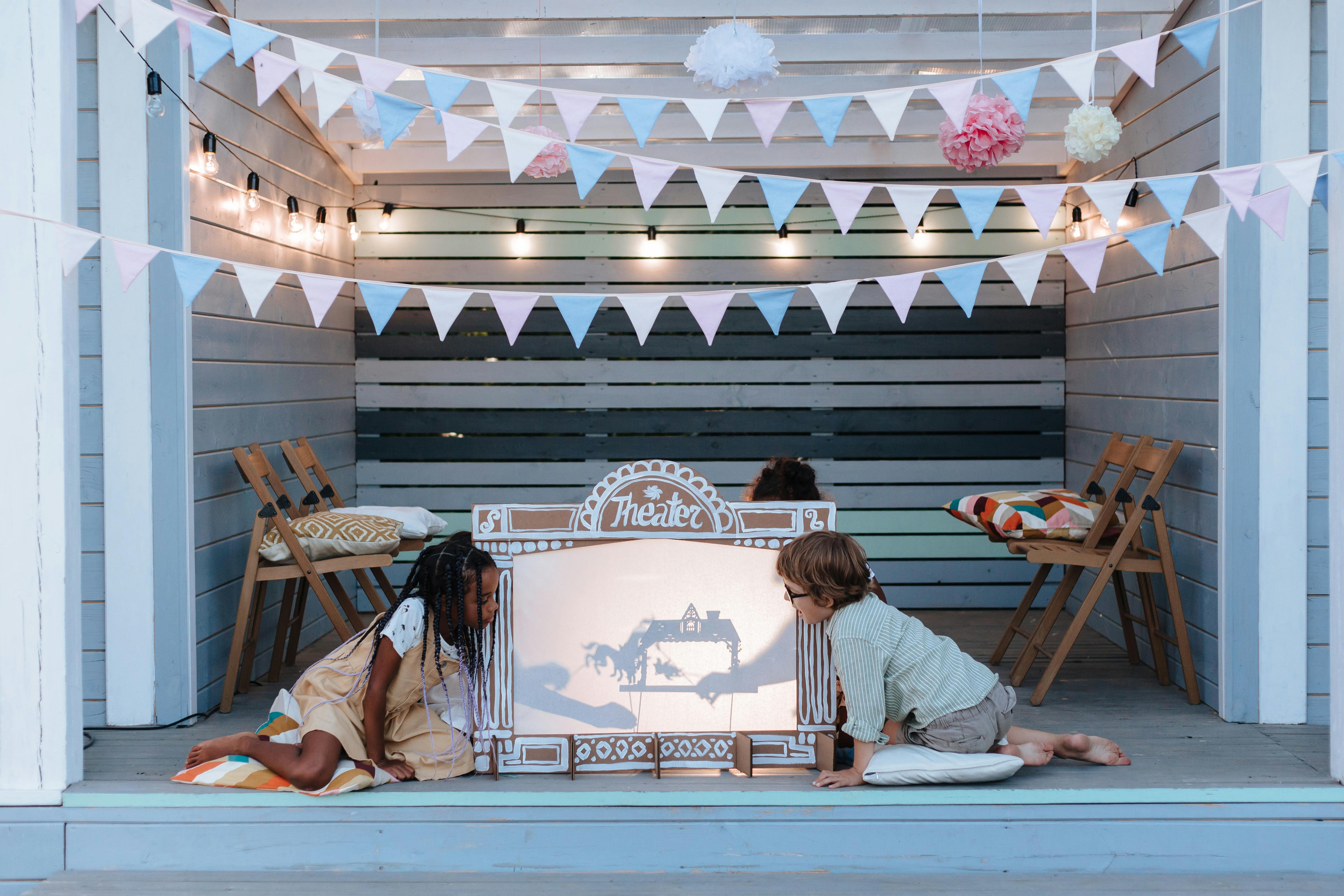 Children engaged in creative play and making activities